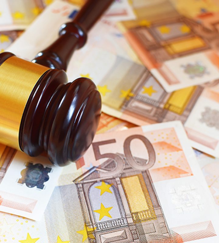 Judge gavel and euro money banknotes. Judgement, justice and bribery concept.