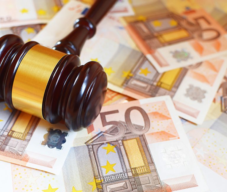Judge gavel and euro money banknotes. Judgement, justice and bribery concept.